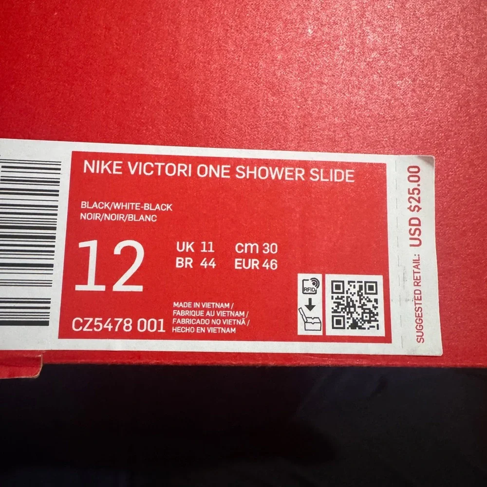 Nike Black Slide Sandals with White Swoosh Accent - Picture 4 of 4